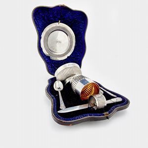 A travel silver set, England 20th Century, with original box, defects