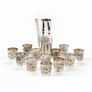 A silver ewer and twelve glasses, Florence 20th Century