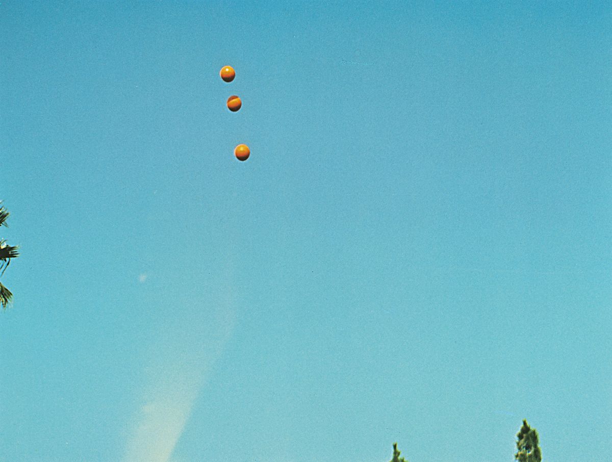 John Baldessari - Throwing Three Balls in the Air to get a Straight Line (best of 36 attempts), 1...