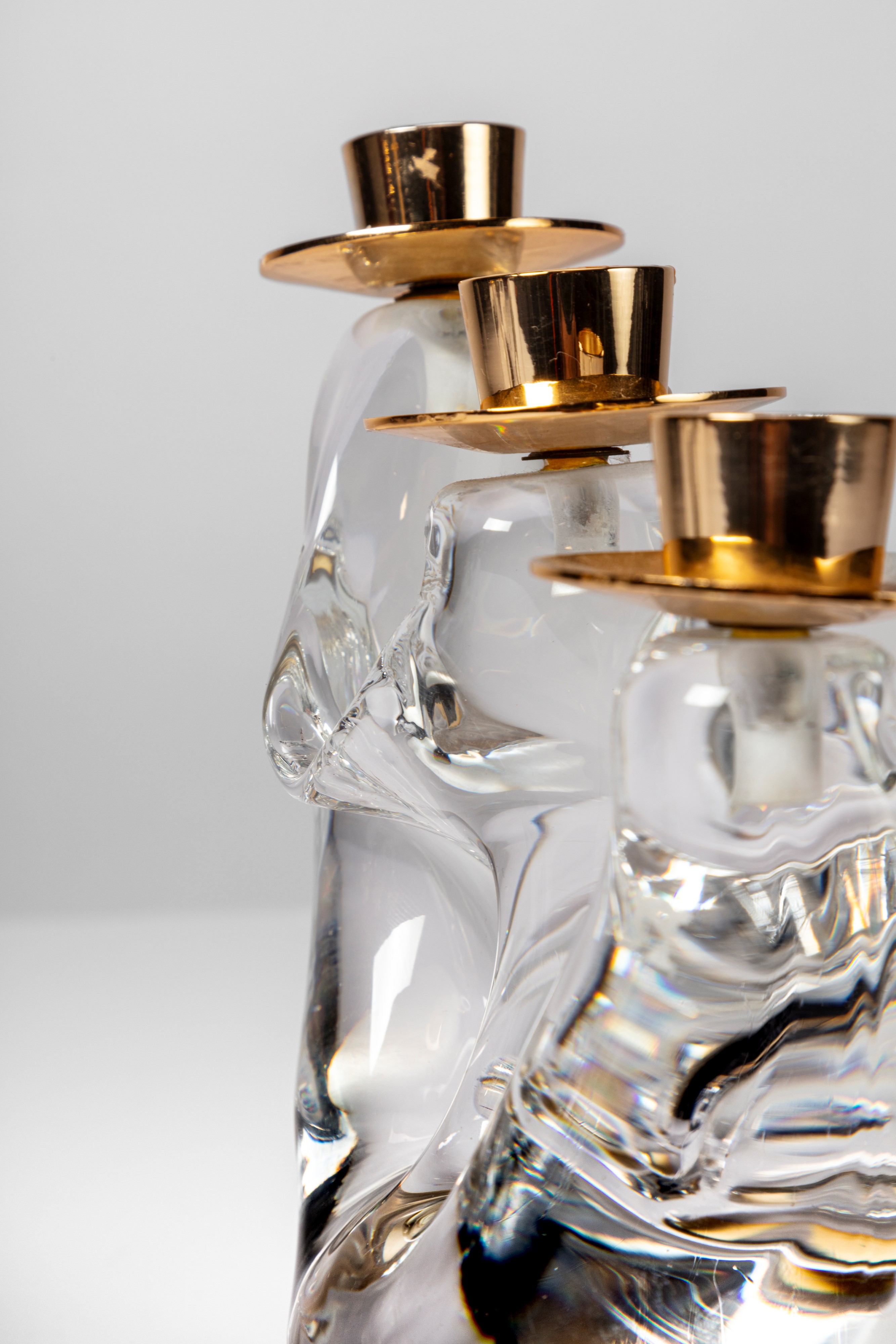 Coppia di candelieri scultorei