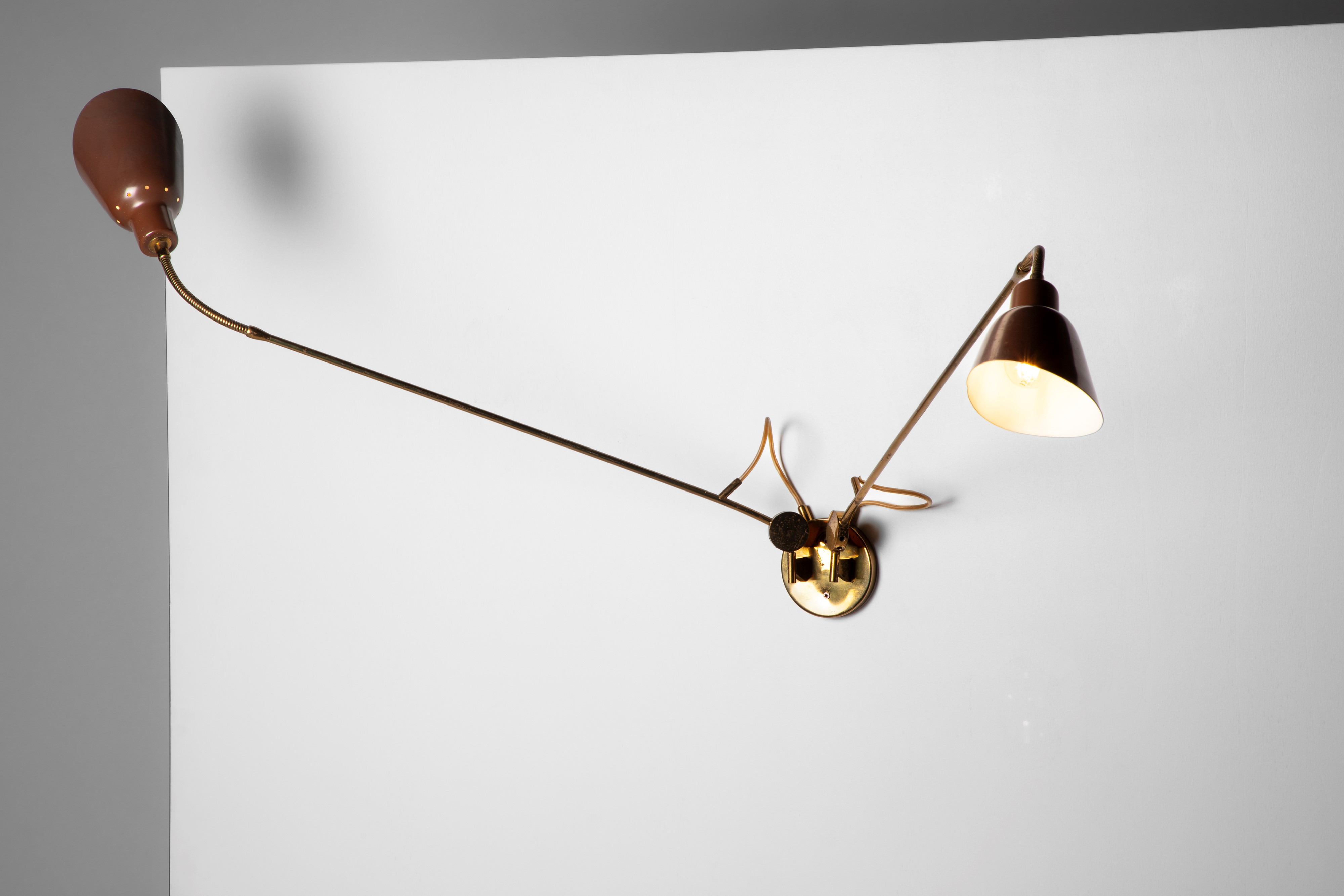 Lampada da parete orientabile