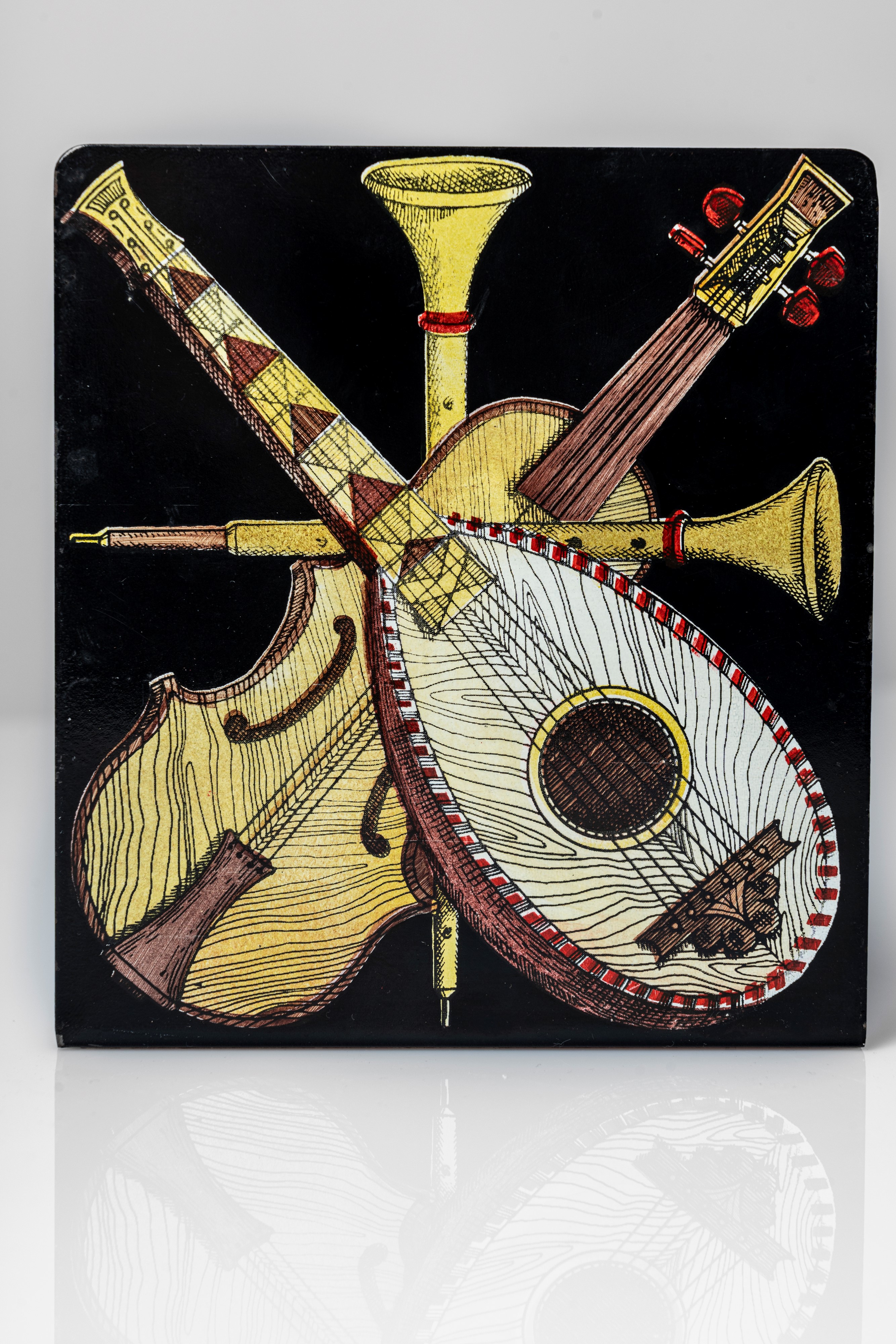 Coppia di fermalibri 'strumenti musicali'