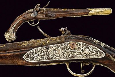 Pistola a Pietra Focaia con Fornimenti in Argento