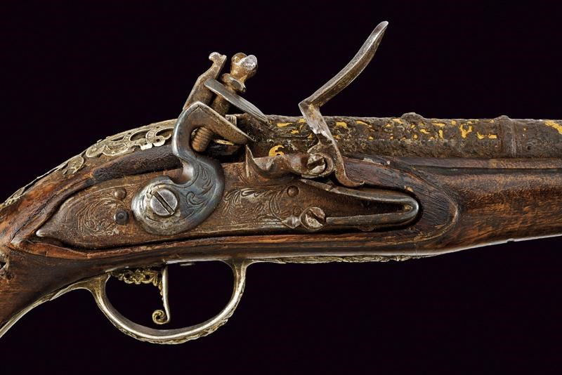 Pistola a Pietra Focaia con Fornimenti in Argento