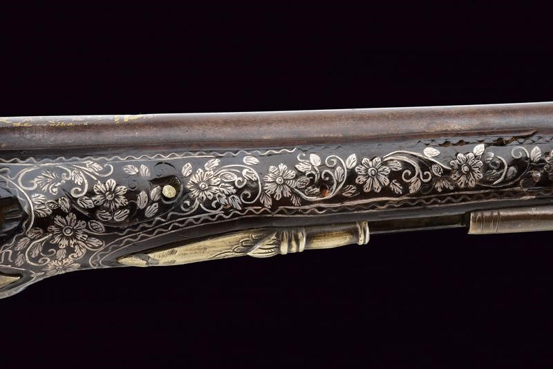 Pistola a Pietra Focaia con Bellissime Decorazioni in Argento