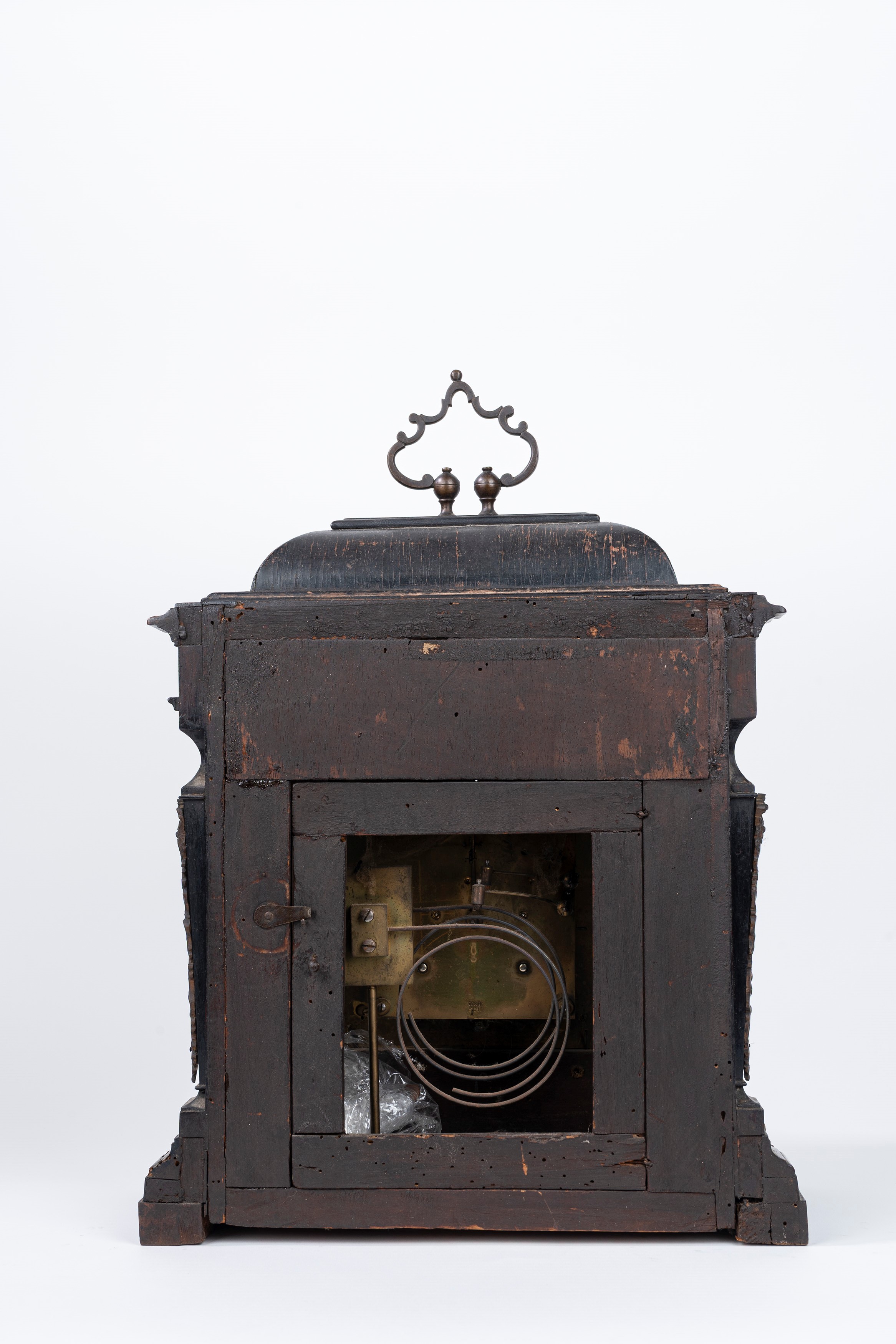 Pendola romana in legno ebanizzato e applicazioni in bronzo