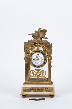 Gilded bronze and marble clock with zircons, 19th century