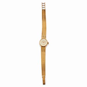 A 18K yellow gold lady's wristwatch, Ticin