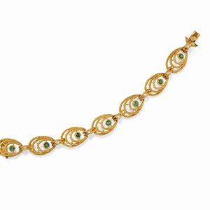 A 18K yellow gold, emerald and diamond bracelet, circa 1960