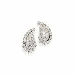 A 18K white gold and diamond earclips