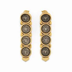 A silver, 18K yellow gold and coins pendant earrings, Marina B.