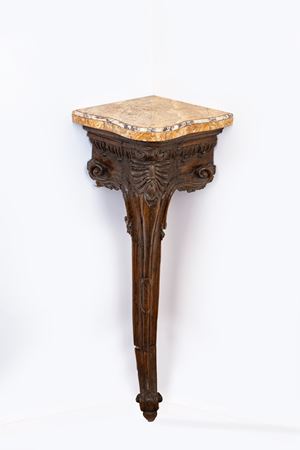 Carved wooden corner cabinet with marble top, 18th century