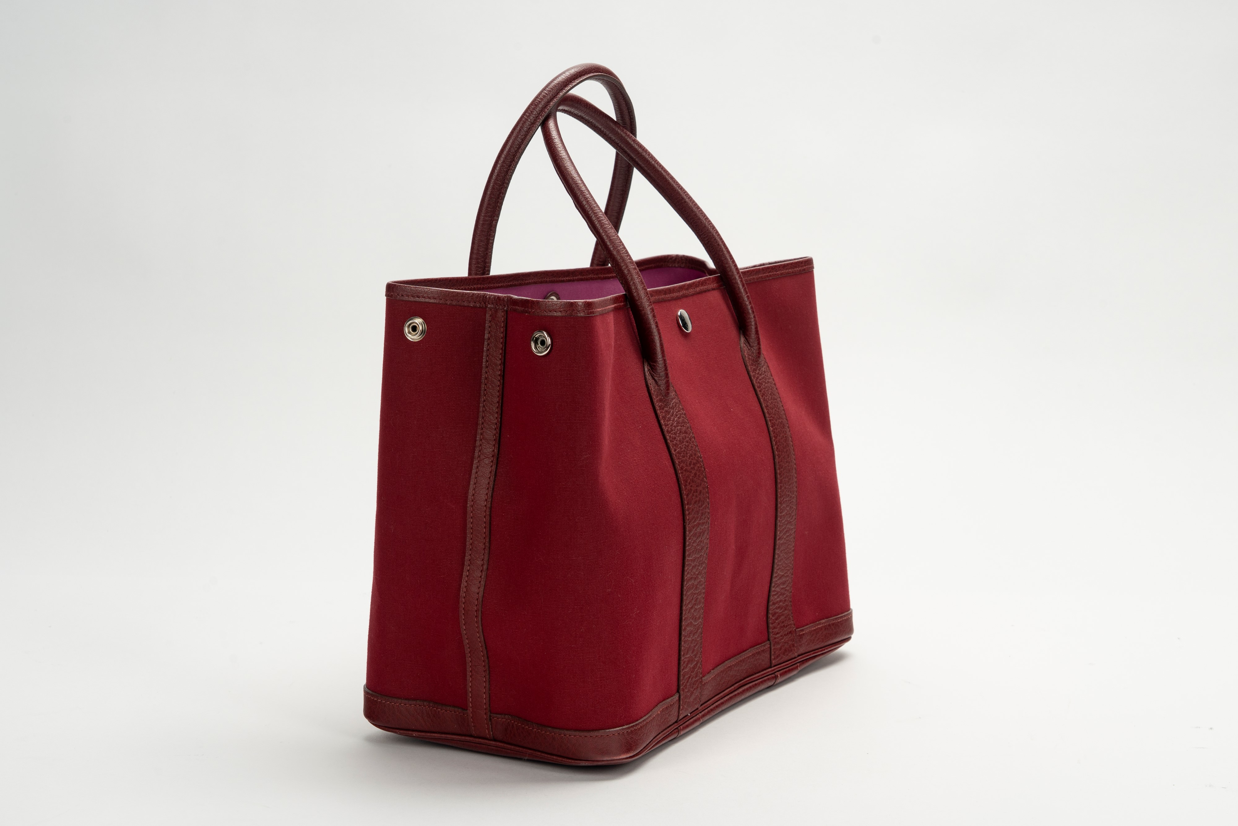 Hermès - Borsa Garden Party, tela color burgundy con profili e manici in pelle clemence, 2006