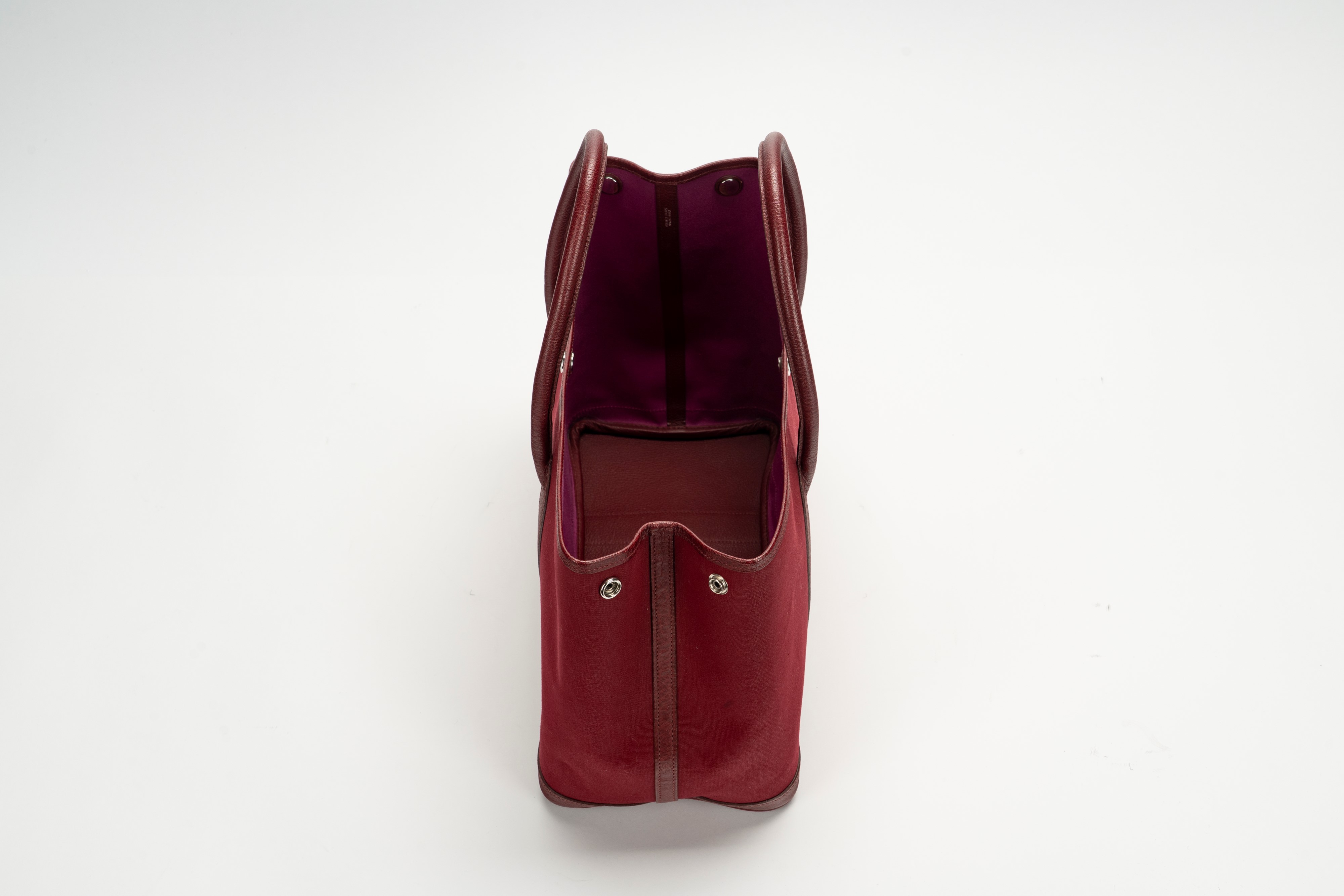 Hermès - Borsa Garden Party, tela color burgundy con profili e manici in pelle clemence, 2006
