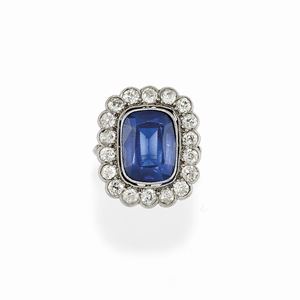 A 18K white gold, synthetic sapphire and diamond ring, early 20th Century