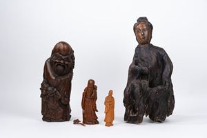 Lotto composto da quattro figure in legno scolpito. Cina, secolo XX