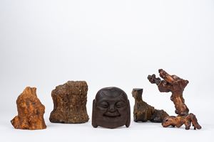 Lotto composto da una testa di Budda, una mensolina in radica, una scultura "scholar's rock" e due pietre fossili a guisa di montagna rocciosa