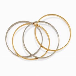 Quattro bracciali in oro