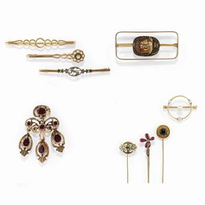 Nine low-carat and 18K yellow gold, colored gemstones, pearl and diamond brooches