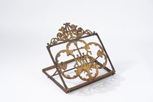 Antique iron and bronze lectern with monogram of the Society of Jesus