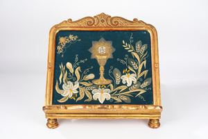 Carved and gilded wooden lectern with an embroidered panel inside, 19th century