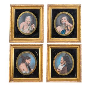Four tempera paintings on parchment depicting saints, in oval