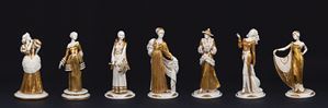Lot of seven sculptures in white and gold Capodimonte porcelain, depicting young ladies