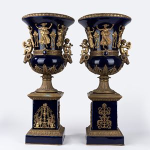 Pair of large blue porcelain vases with gilded bronze applications, first half of the 20th century