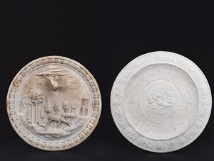 Coppia di tondi a bassorilievo in gesso, uno raffigurante il Paradiso Terrestre, dalla Basilica di S. Maria del Popolo a Roma, l'altro con putto a cavallo di un tritone