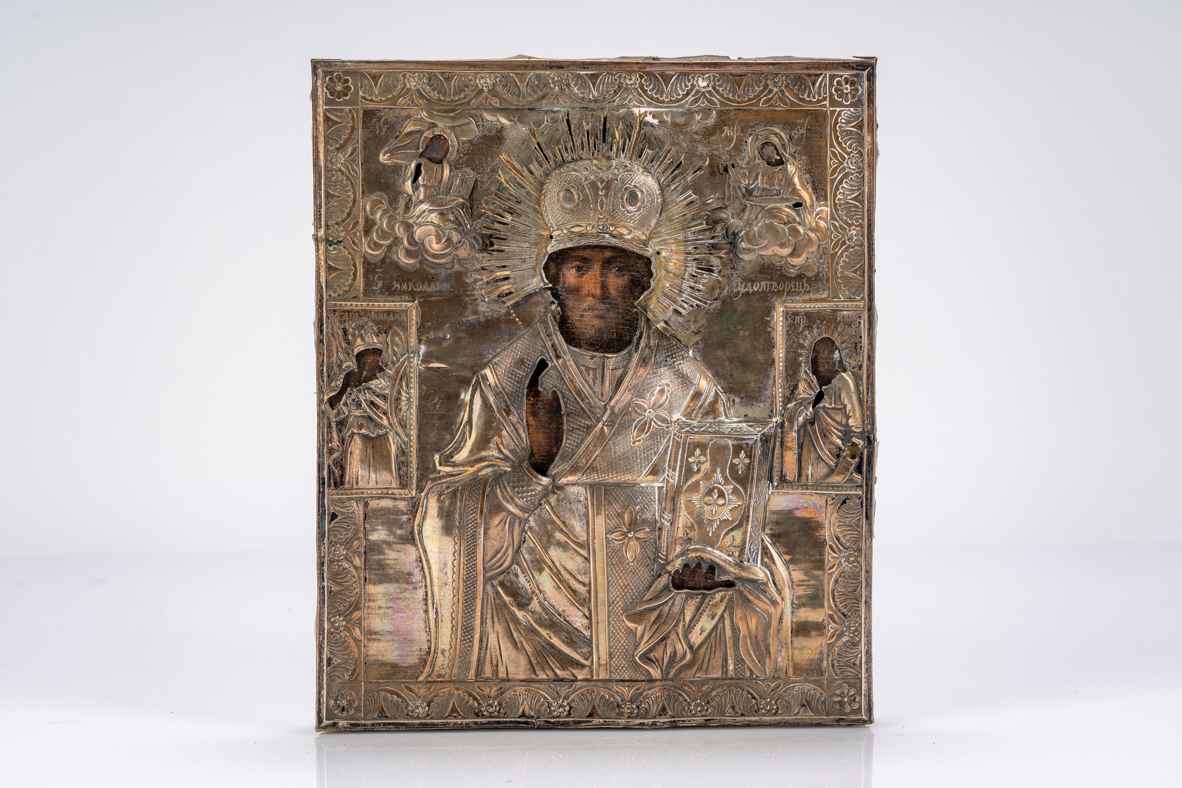 Panel icon with silver riza depicting Saint Nicholas among saints ...