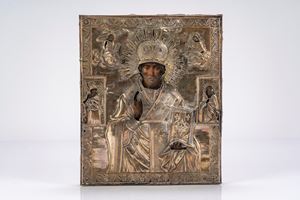 Icona su tavola con riza in argento raffigurante san Nicola tra santi. Russia, XIX secolo