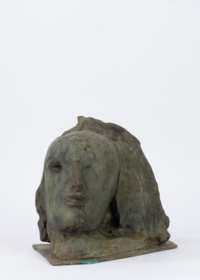 Volto, scultura in bronzo con patina bruna
