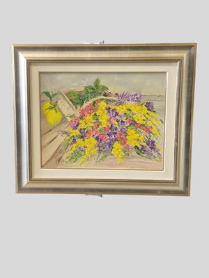 Cesto di fiori con limoni