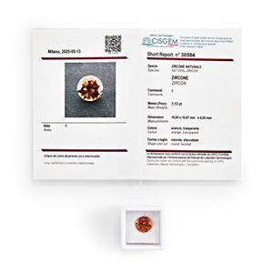 Orange zircon in paper 7.17 ct