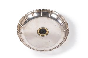 Svuotatasche con moneta romana