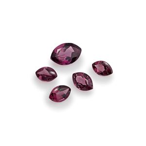 Lotto di cinque tormaline rosa in cartina per totale ct 9,60