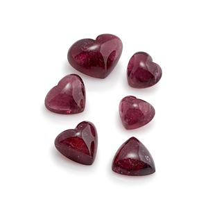 Lotto di sei tormaline rosa in cartina per totale ct 173,31