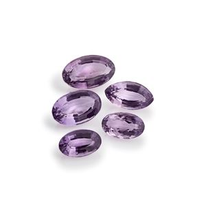 Lotto di cinque ametiste in cartina per totale ct 129,13