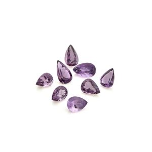 Lotto di otto ametiste in cartina per totale ct 143,00