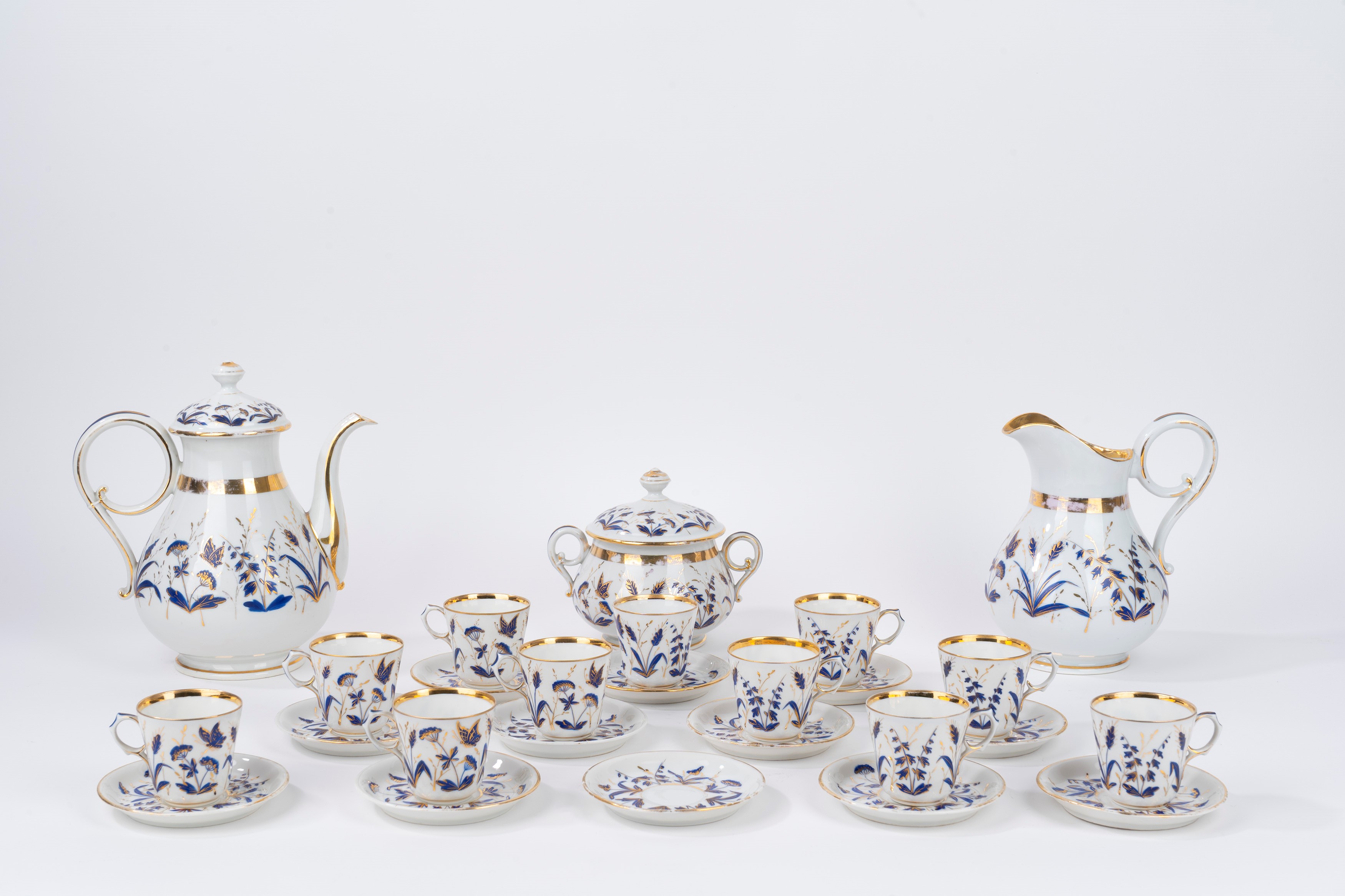Servizio in Porcellana Bianca con Decori Blu e Oro, Inizi Secolo XX