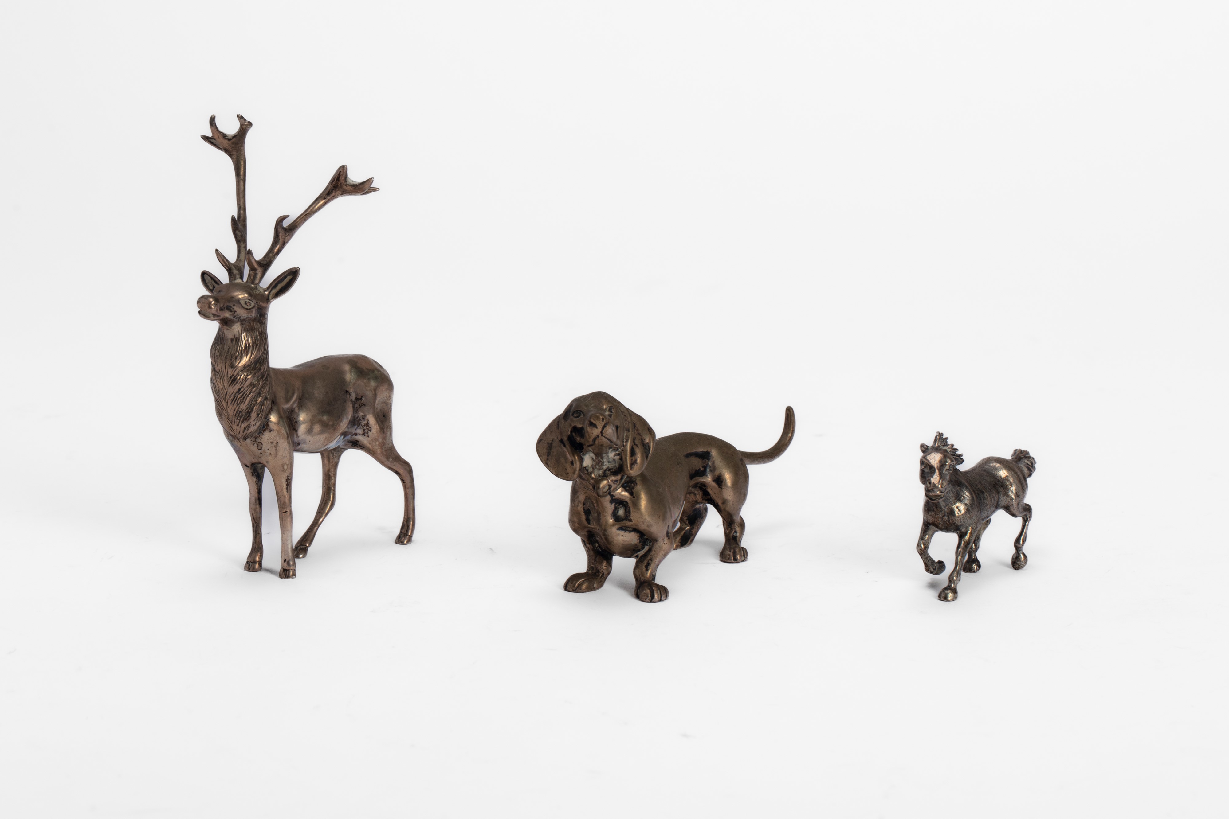 Tre sculture in argento a foggia di animali, Seconda metà secolo XX
