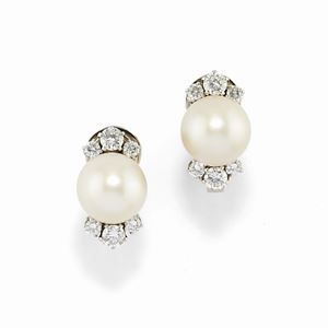 A 18K white gold, cultured pearl and diamond earrings