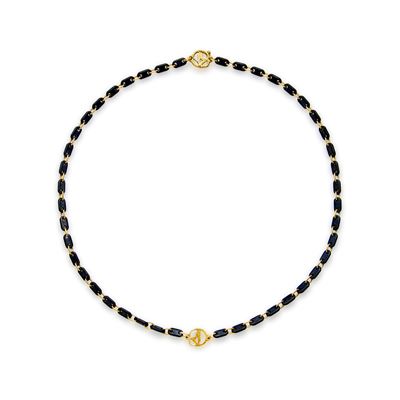 Collana in oro giallo 18k con elementi in titanio