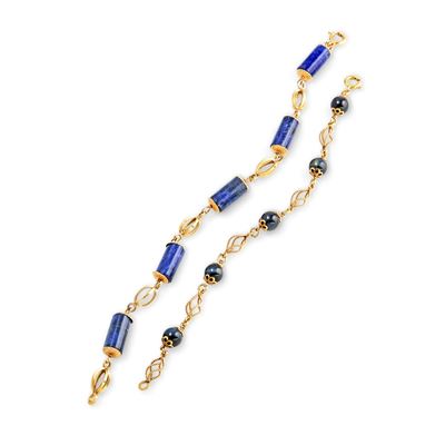 Due bracciali in oro giallo 18k con pietre dure