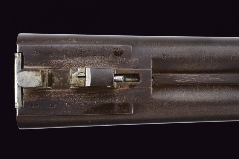 Doppietta a Percussione Centrale a Cani Esterni di Holland & Holland
