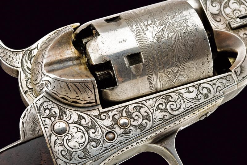 Importante paio di Colt Model 1851 Navy con incisioni di fabbrica stile Gustave Young, in cassett...