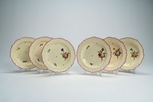 Sei piatti in terraglia smaltata con decoro floreale. Manifattura G. Baroni, inizio secolo XIX