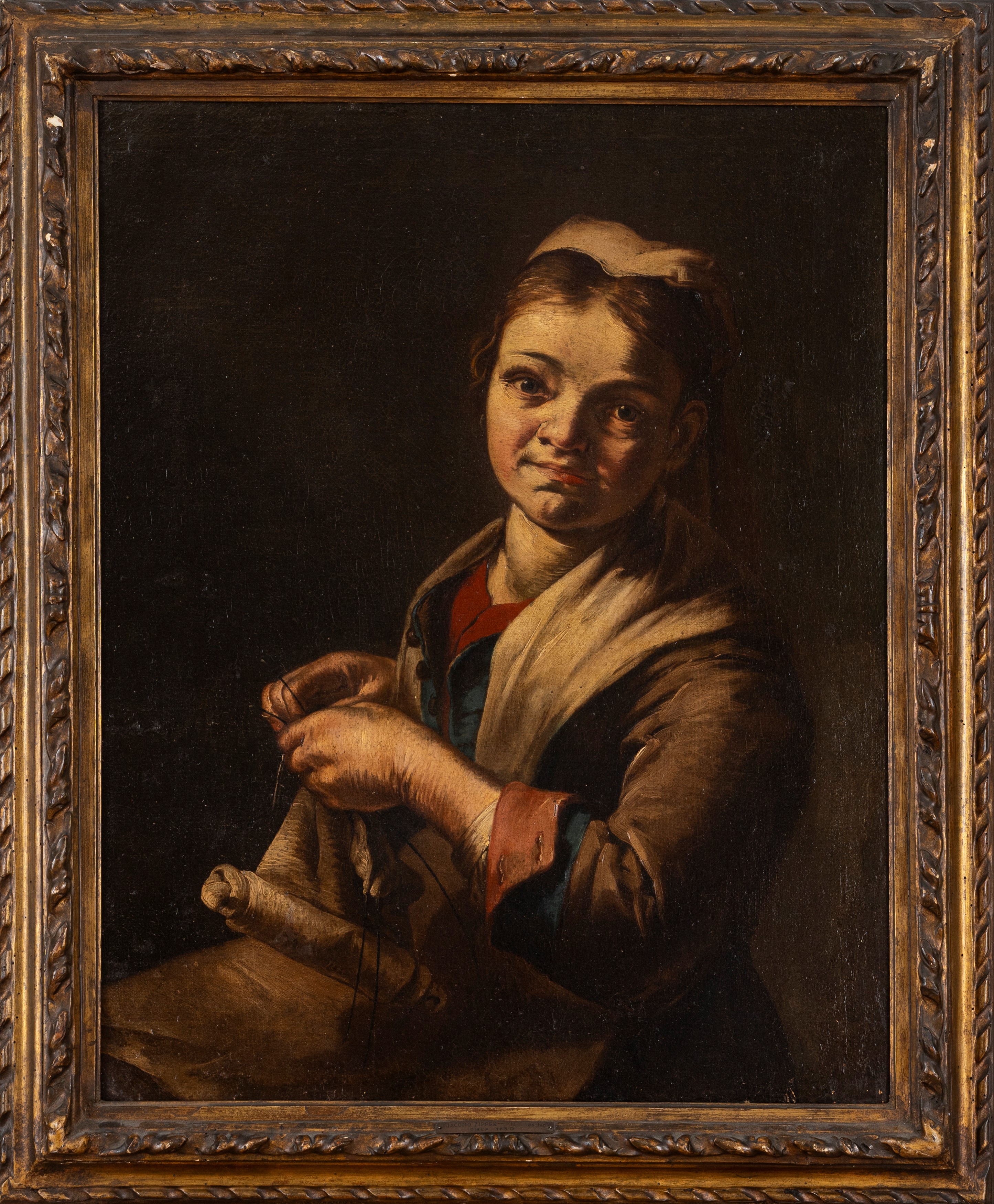 Giovane donna che lavora ai ferri