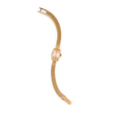 Orologio in oro giallo 18k con cassa tonneau