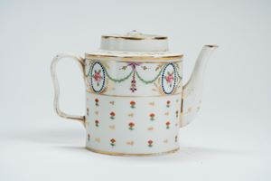 Porcelain teapot with cover, decorated in polychrome and gilt with geraniums and roses within blue beaded medallions and festoons. French manufacture, late 18th – early 19th century